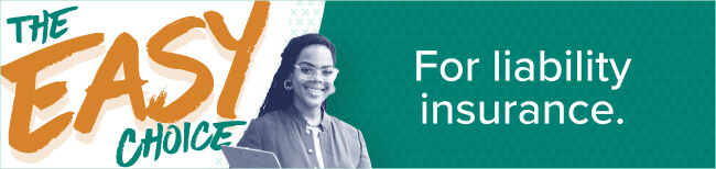 holding notes and smiling with easy choice campaign banner behind her 