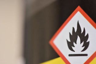 Diamond-shaped flammable sign.