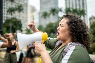 Nurse leading a protest for better working conditions. Nursing strikes are usually a last resort