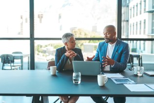 Insurance Agent and nurse prepare for a licensing board disciplinary review