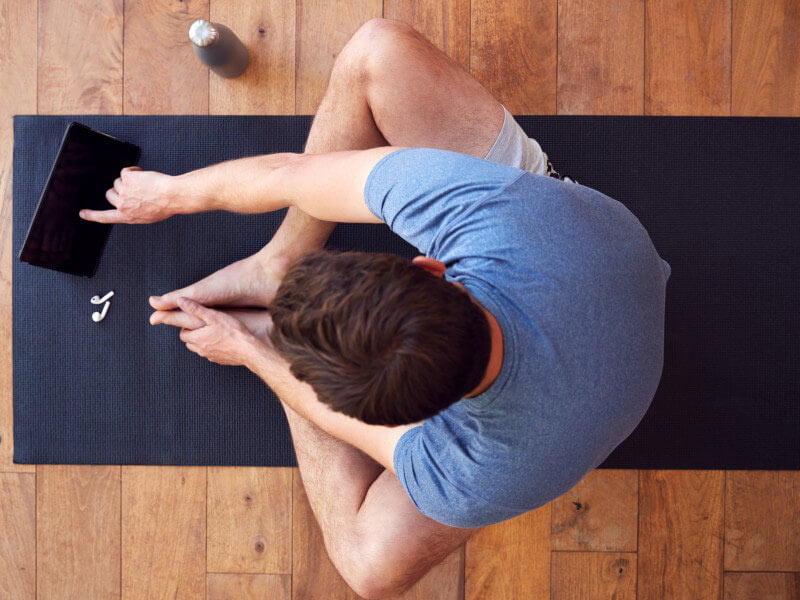 occupational therapist on yoga mat