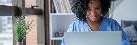 female nurse searching researching types of malpractice insurance for nurse practitioners