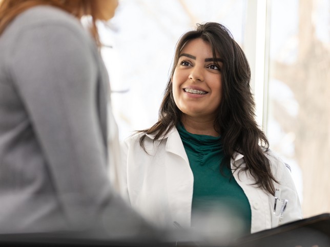 Nurse working with patient | Nurse practitioner malpractice insurance requirements