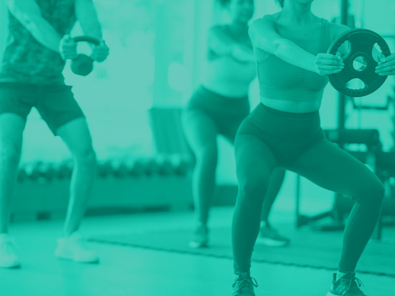 people working out at fitness gym facility | fitness facility insurance 