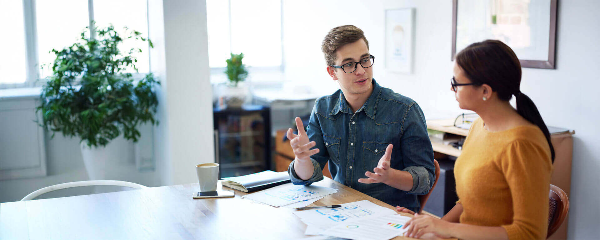 Bookkeeper working with client | insurance for bookkeepers