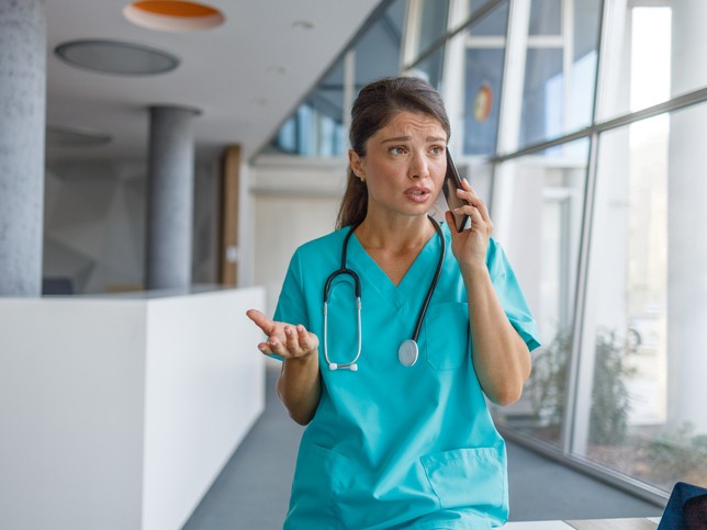 Nurse on phone with insurance company 