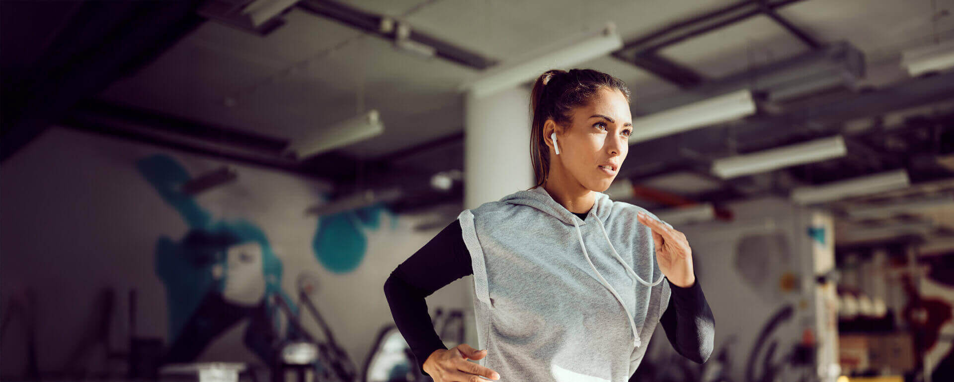 personal trainer running at fitness facility | liability insurance for exercise instructors