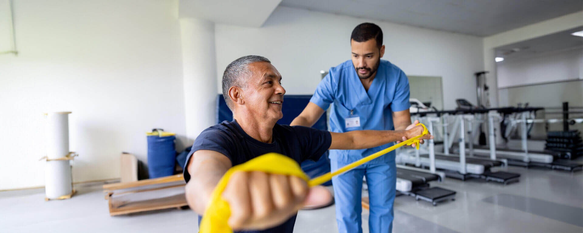 physical therapist with client in facility | physical therapists insurance