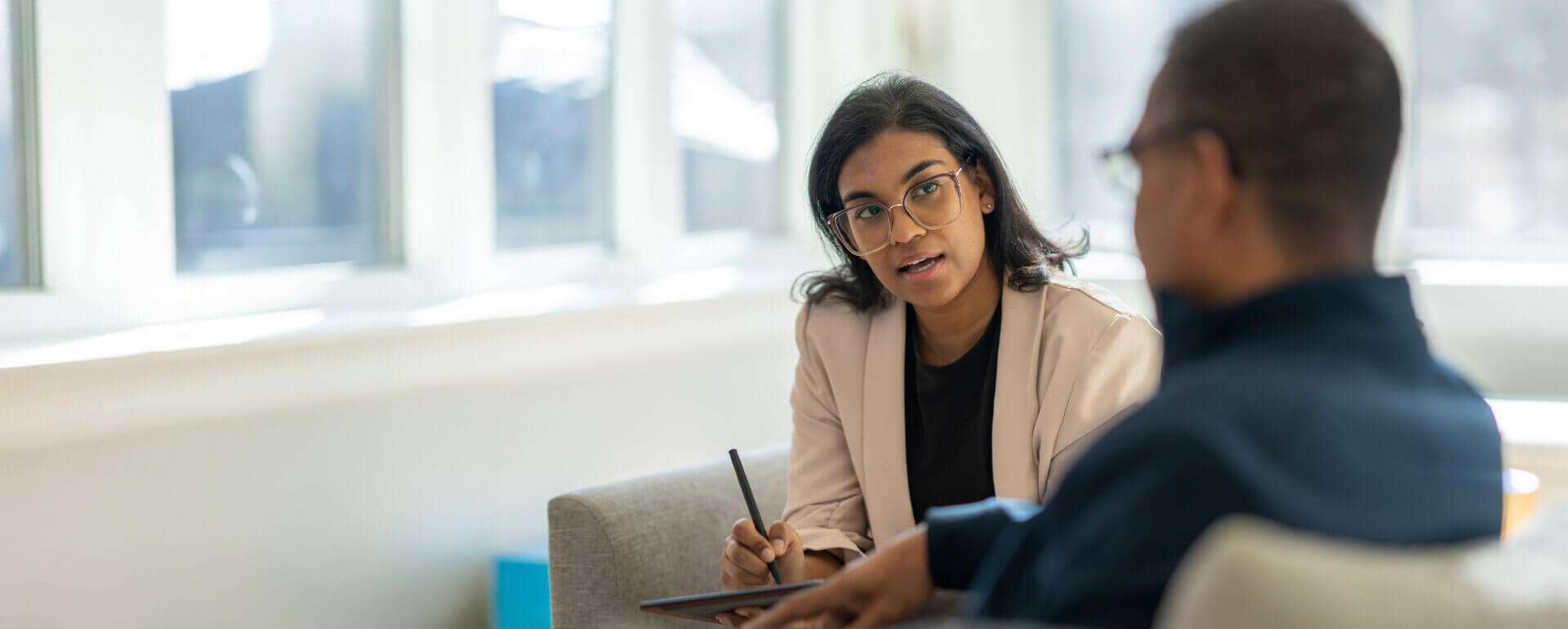 psychologist working with client in office | psychologist malpractice insurance