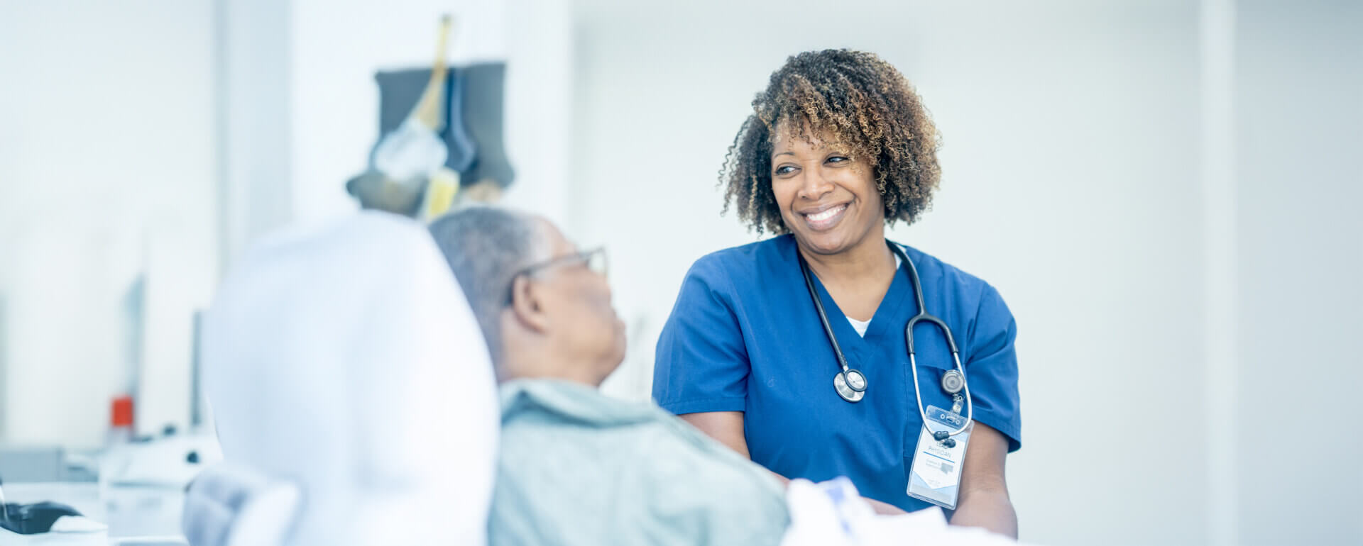 Registered nurse with patient | registered nurse malpractice insurance