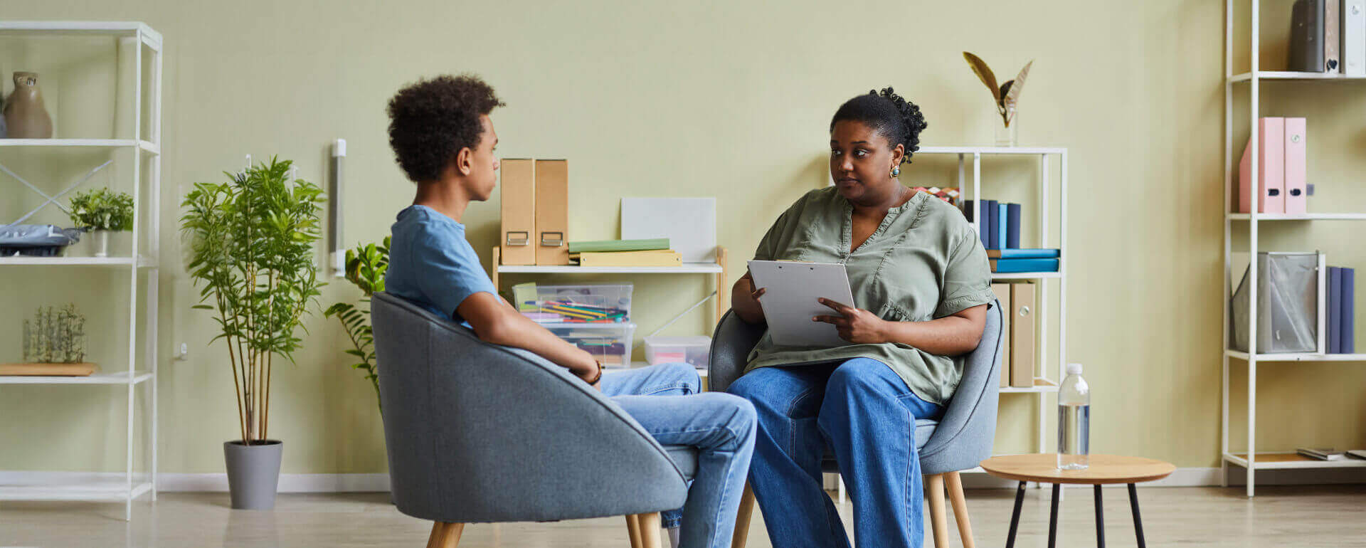 Social worker working with young person | social work liability insurance