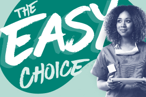 Nurse in scrubs holding nurse's notes on clipboard