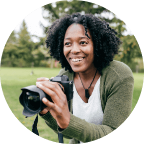 Professional photographer outside with her camera