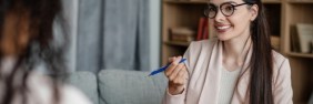 Female counselor with client in her practice | How to get general liability insurance for small businesses