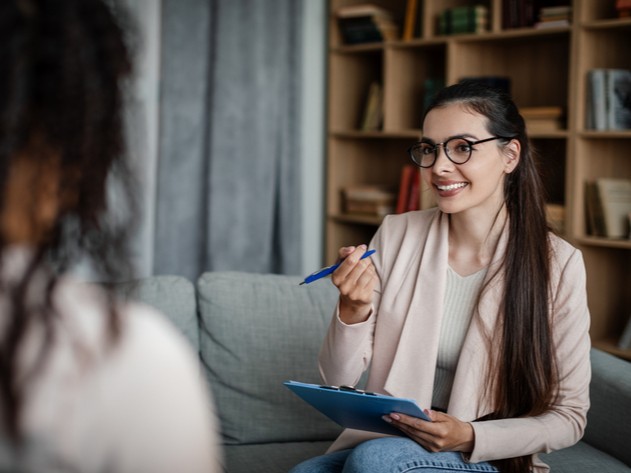 Female counselor with client in her practice | How to get general liability insurance for small businesses