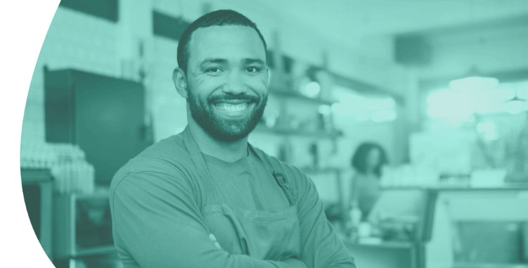 man smiling in his business | business personal property insurance