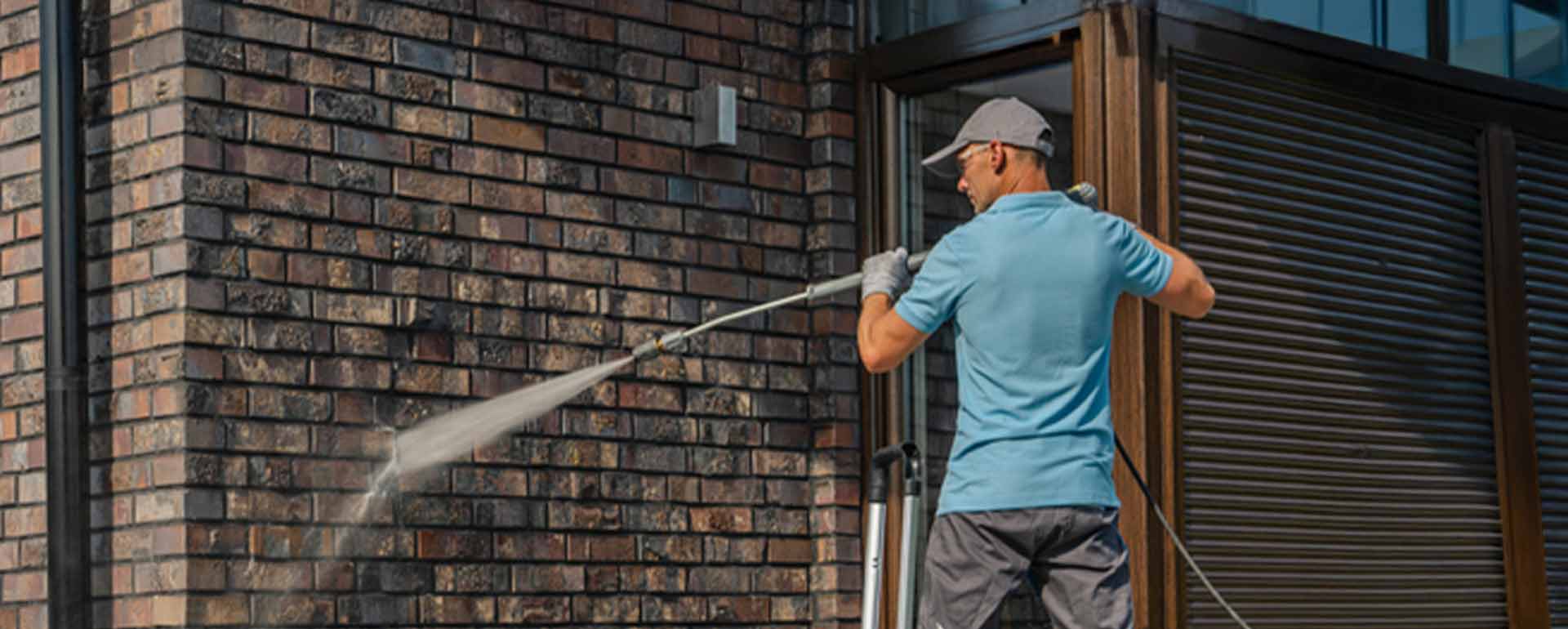 exterior cleaner using power washer insurance for exterior cleaning businesses | insurance for exterior cleaning businesses
