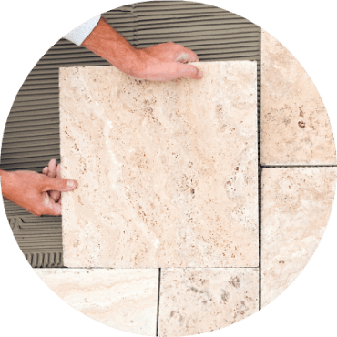 interior artisan laying floor tiles