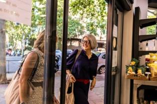 two female shoppers entering a business protected by commercial general liability insurance