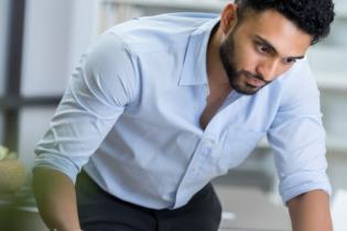 business owner reading through his small business insurance | best insurance for small business owners