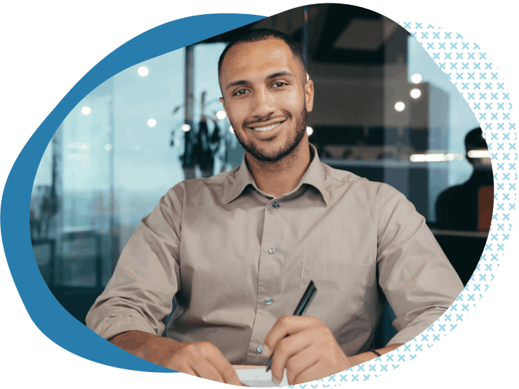 businessman writing smiling errors and omissions insurance for financial professionals