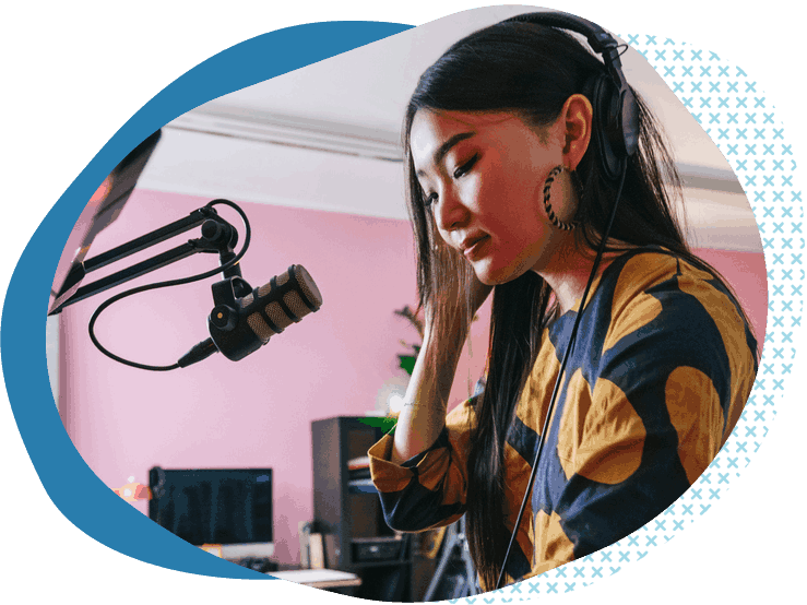 female dj with headphones playing music after buying dj liability insurance